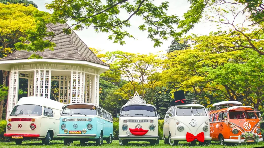 Restored vintage VW Kombi used as a sustainable, circular-economy brand-activation vehicle in a Singapore garden setting