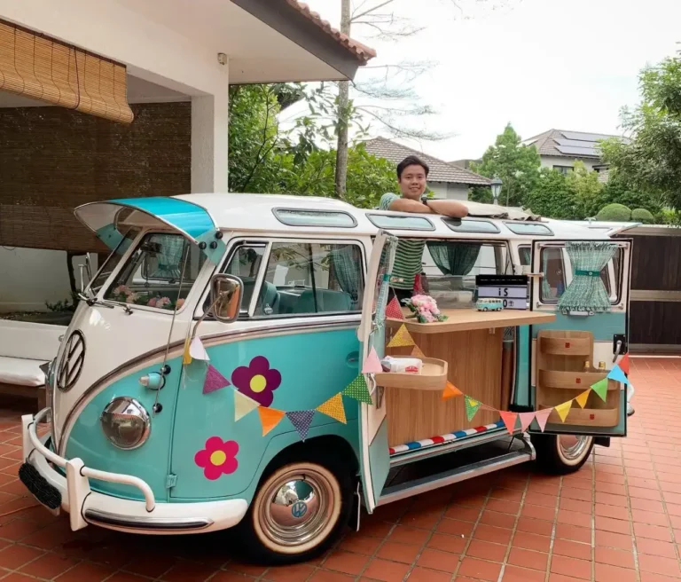 Tiffany-blue vintage VW Kombi styled as a wedding car at a Singapore venue