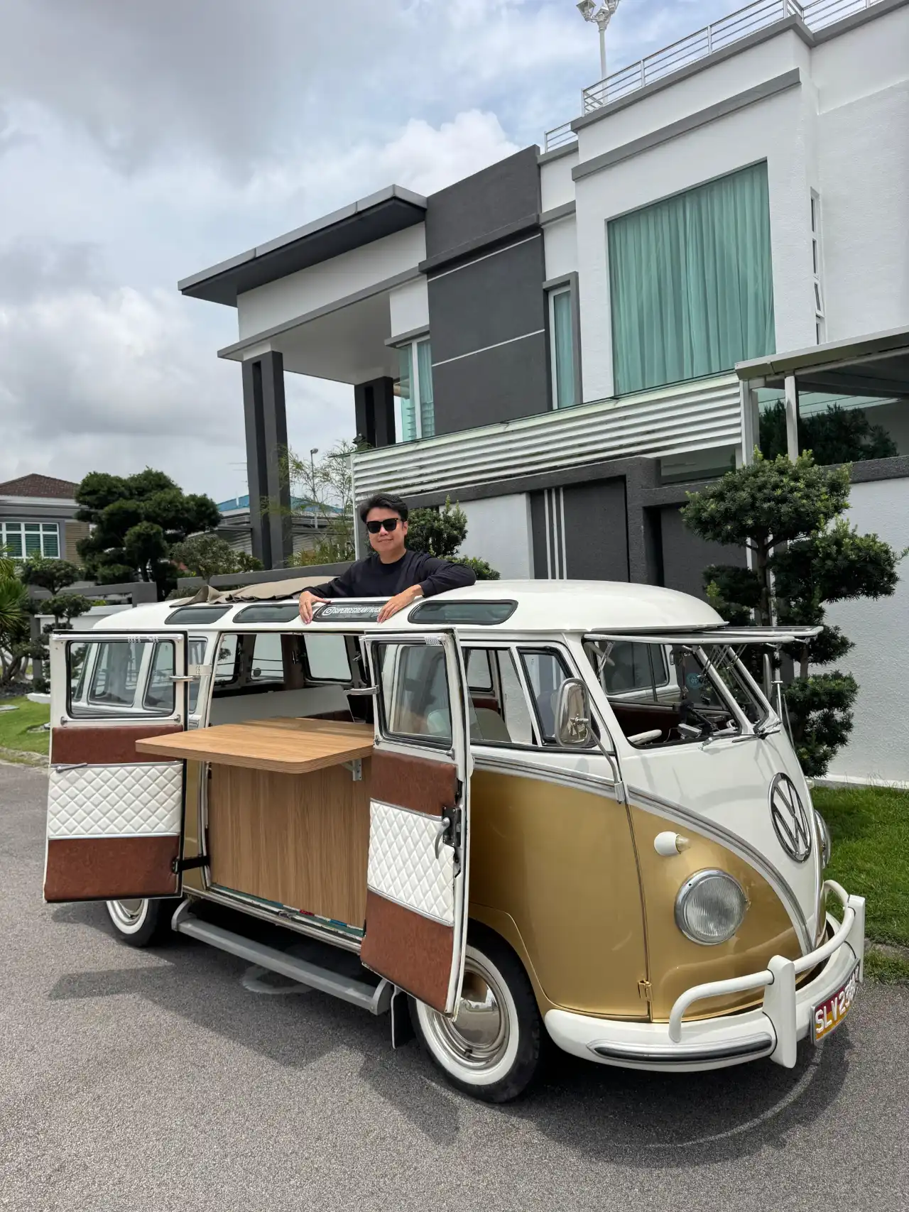 Restored vintage VW Kombi parked at a Singapore event, styled as a wedding and activation vehicle